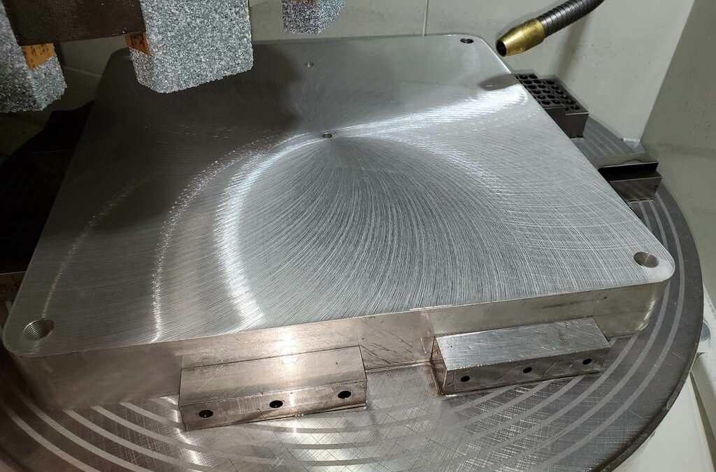 Build plates build back better with rotary surface grinding